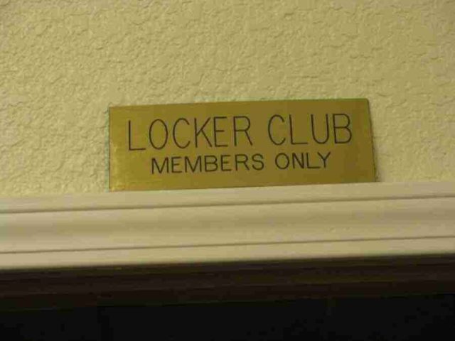 membership-lounge - 3 brass lable above the Locker Club for members only